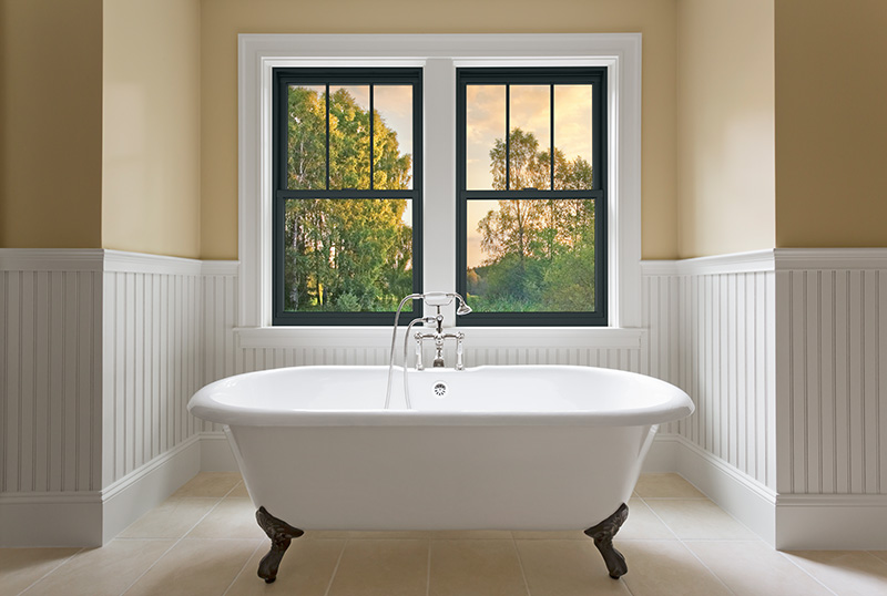 Bathtub in custom designed unfurnished bathroom.